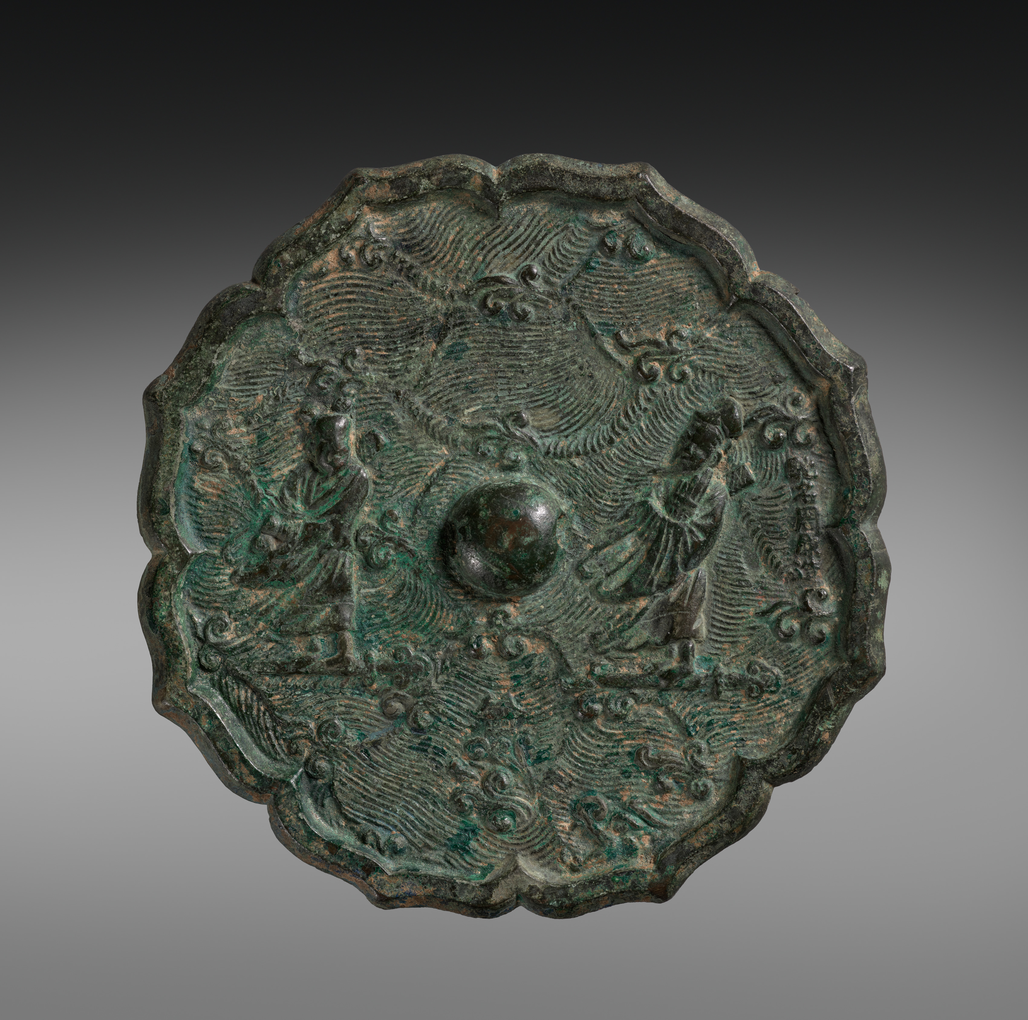 Octafoil bronze mirror with two immortals crossing waves.